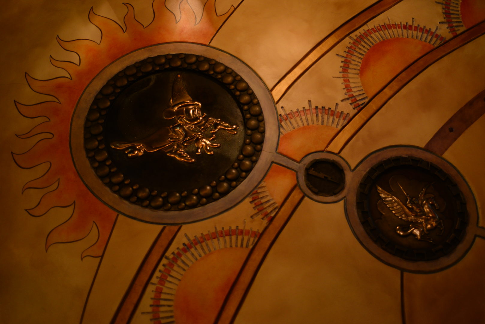 Sorcerer's Workshop - Mickey Metal Sculpture on the ceiling of Animation Courtyard in Disneyland