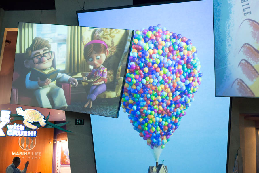 Scene from Pixar's Up - Carl and Ellie Holding Hands and Balloons at Disneyland's Animation Courtyard