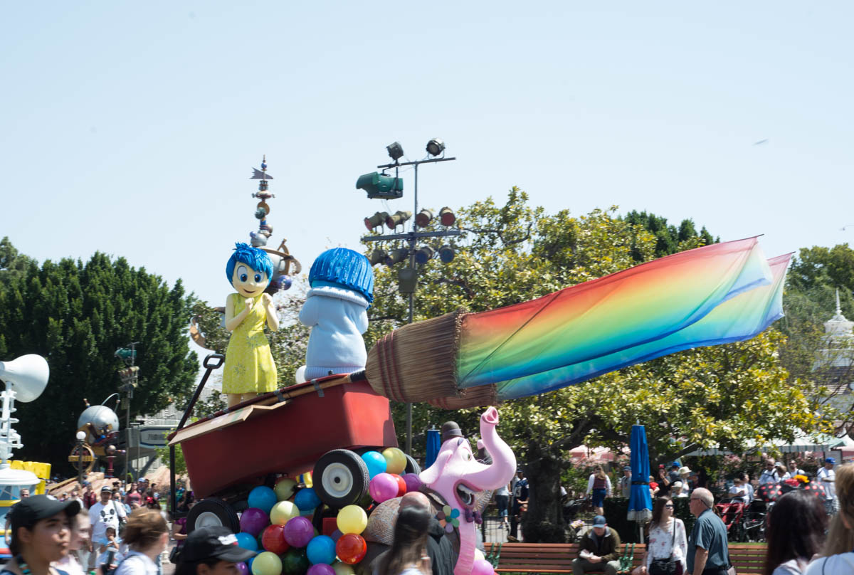 Joy and Sadness from Inside Out Pixar Play Parade Float at Pixar Fest in Disneyland