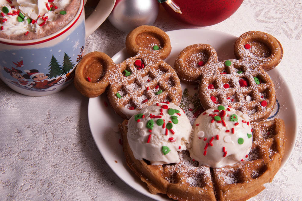 Mickey Shaped Pumpkin Spice Waffles with Ice cream, Sprinkles, and hot cocoa. Christmas Party recipe.