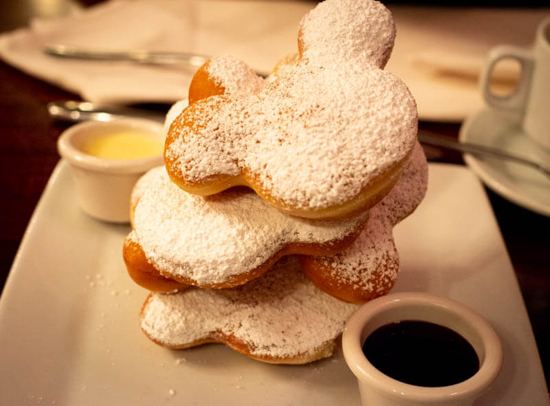 Stack of Mickey Beignets Cafe and Vanilla Coffee Dip Cafe Orleans Disneyland 