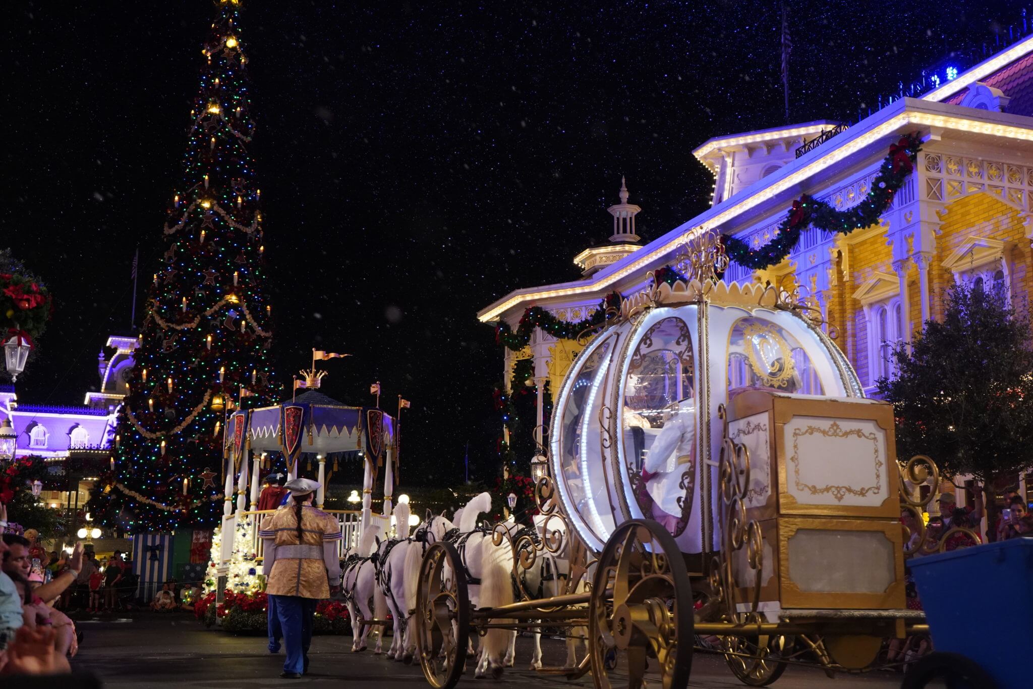 Cinderella Carriage and Christmas Tree in Once Upon a Christmastime Parade on Main Street USA in Disney World