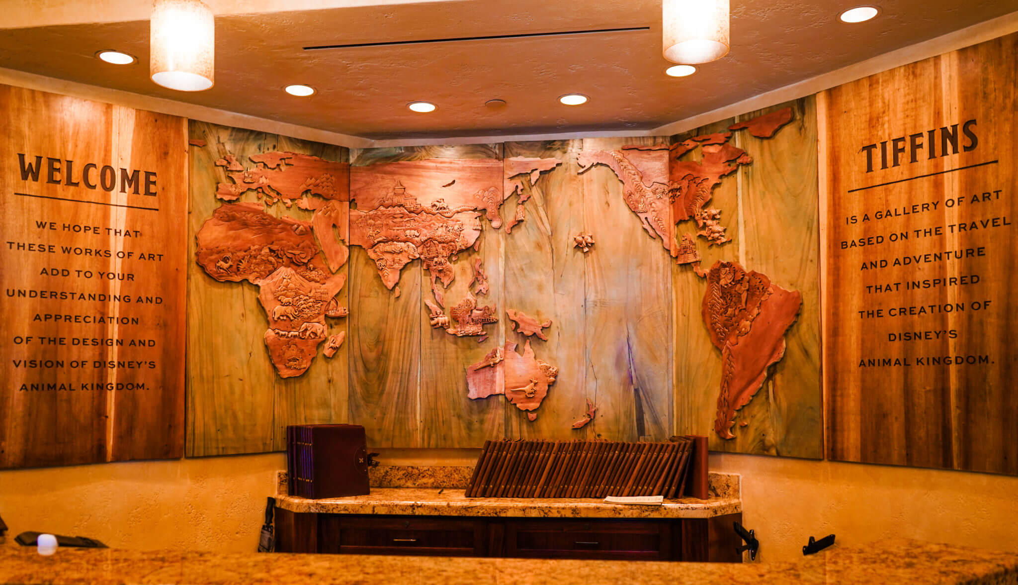 Tiffins Front Desk with wooden map of the world - Animal Kingdom at Disney World