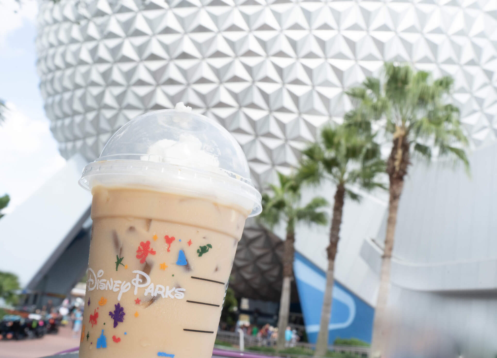 Epcot's Spaceship Earth and Starbucks Iced Coffee in Disney World